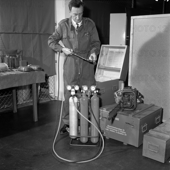 Equipment in the armoury of the civil defence headquarters, 1966.