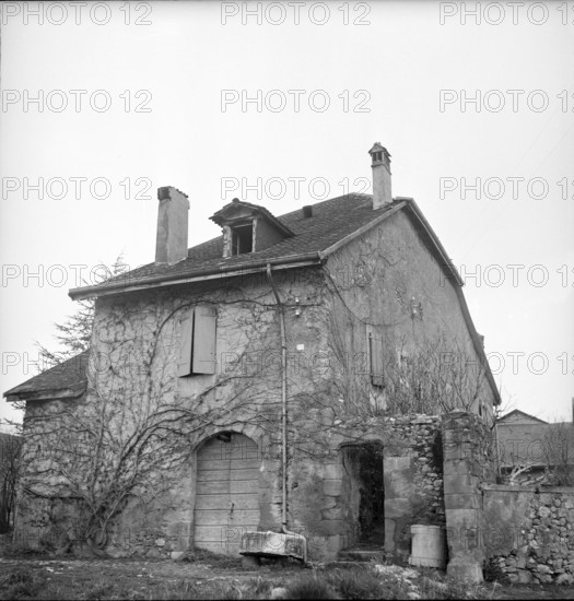 Stone house in Gy; 1947.