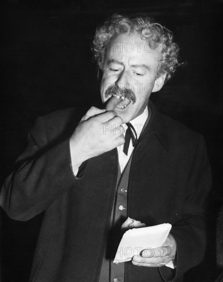Zarli Carigiet eating a sausage, 1961.