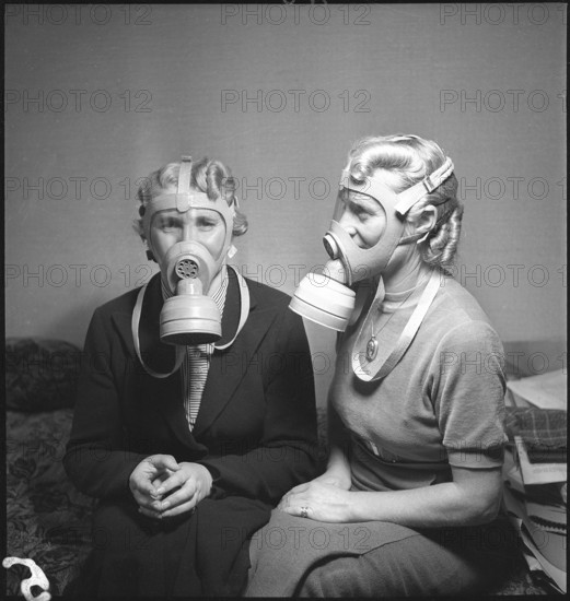 Women with Swiss Gas Masks, 1938.