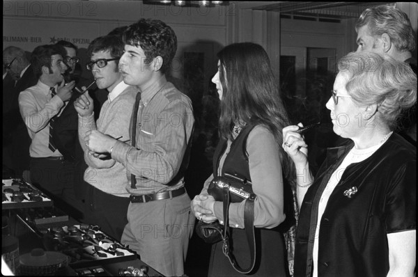 Pipe smokers in front of pipe stall 1969.