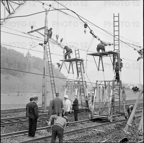 Railway accident in Schwyz; electrician reparing power line 1970.