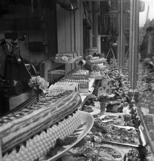 Zurich, meat on display at the Gebruder Niedermann butcher's shop; 1939.