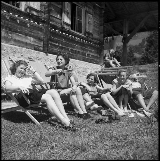 Girl scouts sunbathing, 1952.