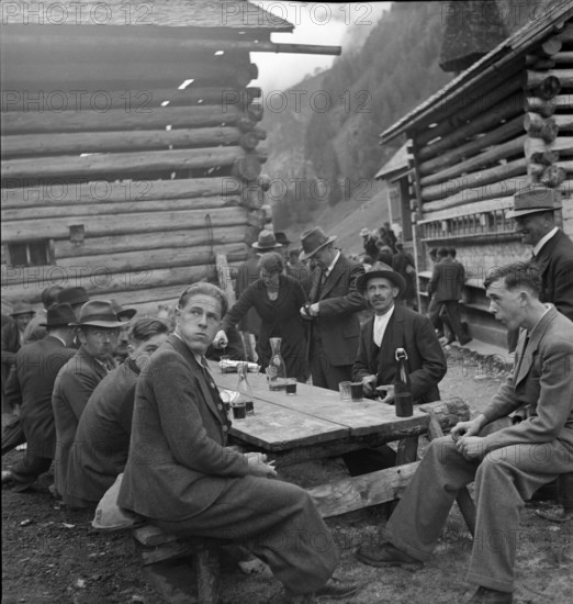 Men after mass in the Calfeisental; 1940.