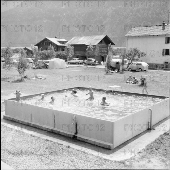 Camping Brigerbad, children playing in pool; 1959.