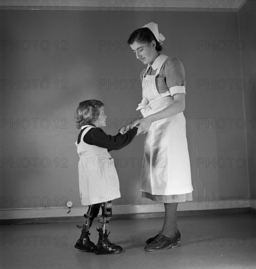 Girl with  splints, Dr. Hallauer Institute Zurich 1942.