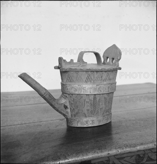 Milk vessel, carved wood cooper work 1944.
