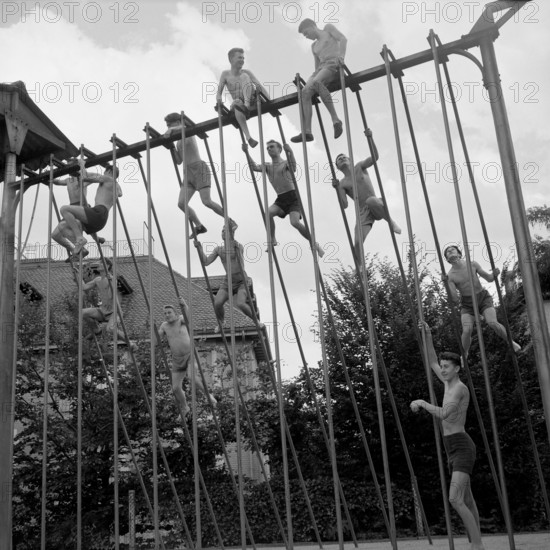 Boys at  climbing poles, Oberseminar Zurich 1957.