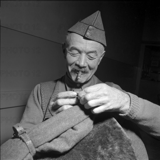 Sixty years old soldier being discharged, La Sarraz 1954.