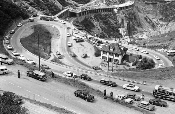 Traffic jam on Gotthard pass road after rock slip 1969.