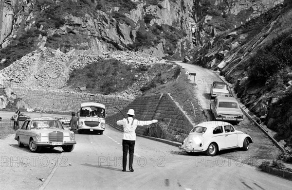 Traffic diversion after rock slip, Gotthard pass road 1969.