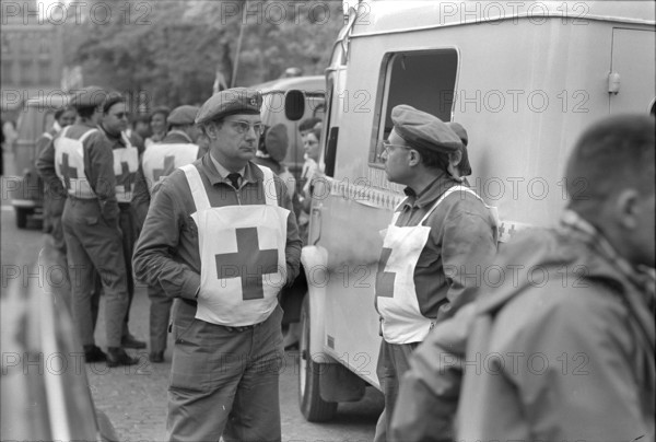 Student riots in Paris 1968: Ambulance, red cross.