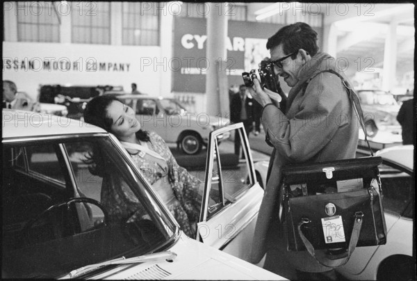 38th Geneva International Motor Show, 1968: hostess wearing a kimono is being photographed.