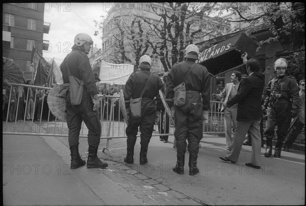 Policemen and roadblock at May Day demonstration in Zurich 1973.