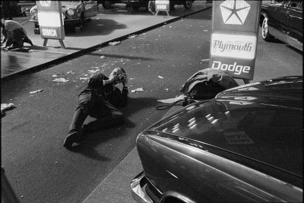 38th Geneva International Motor Show, 1968: visitor taking a picture.