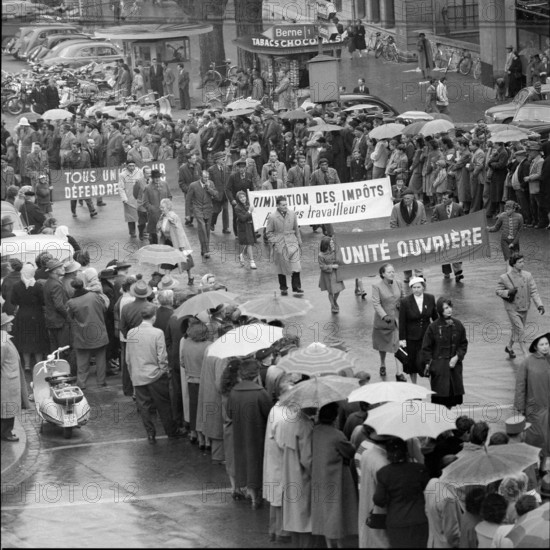 Rainy May Day demonstration in Lausanne 1956.
