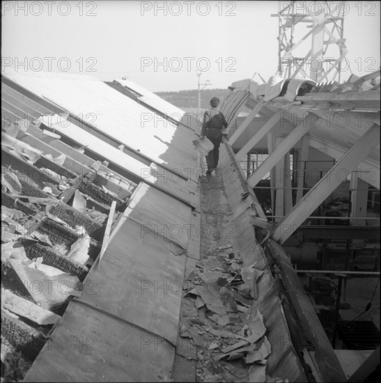 Destroyed shed roof after explosion of acetylen bottle, Les Geneveys 1961.