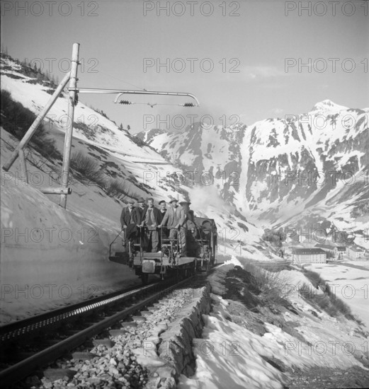 Workers on open goods train in the Rhone valley, 1950.