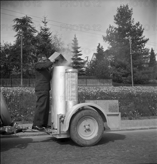 Car drives with wood gas generator due to petrol shortage, Switzerland 1940.
