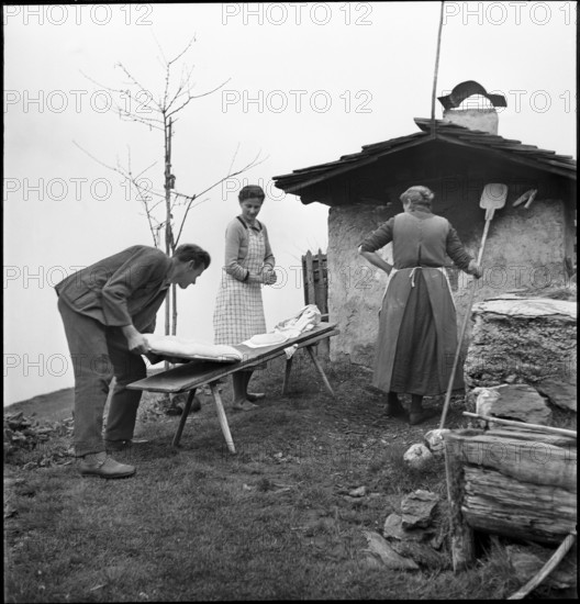 Baking bread in Safien-Zaloen, 1941.