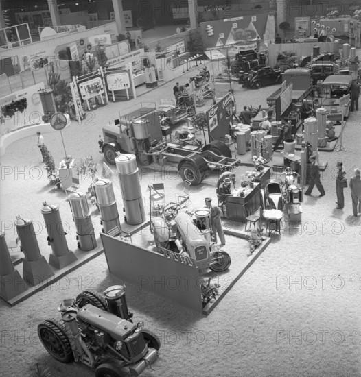 Petrol, gasoline penury, tractor, truck powered by wood gas; 1942.