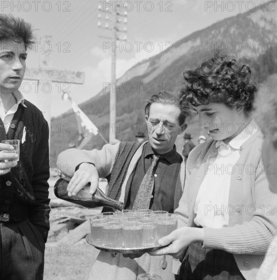 Celebrating the maypole in the Valais, 1954.