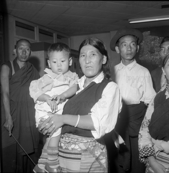 Tibetan refugees arriving at Zurich airport 1963.