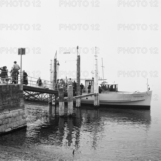 Passengers board a ship in Ascona, 1952.