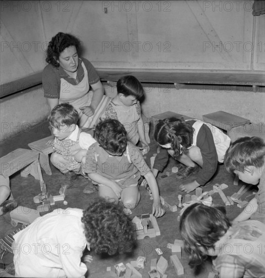 Playing with the teacher.