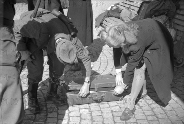 WW 2: Bombing; people fleeing, Delle 1944.