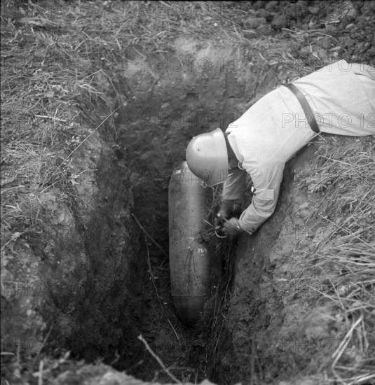 WW 2: bombing in Switzerland; bomb airdrop, dropping, dud, 1943.