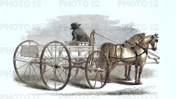 An automatic rein holder on the carriage of a horse-drawn team.