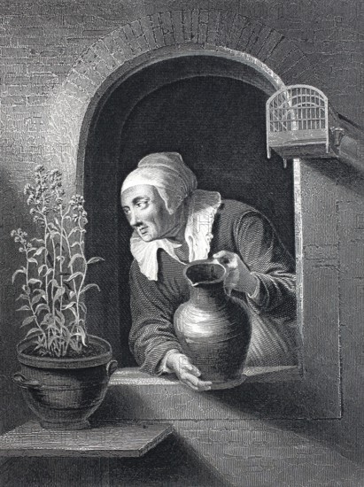Elderly woman watering a flower pot in front of the window.