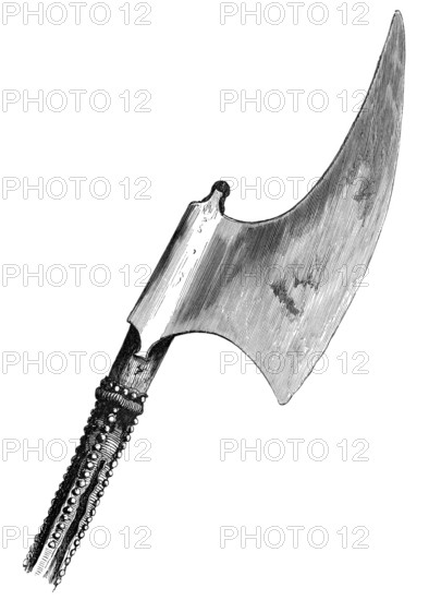 A ceremonial beheading axe from the 16th century. carried by the Master Gaoler of the Tower of London. The staff is studded with brass nails over leather. From the book *The British Army*. 1868. Historical. digitally restored reproduction from a 19th-century original
