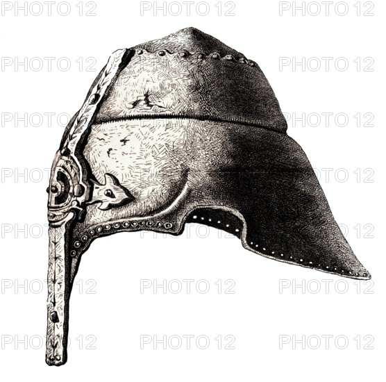 An early 12th-century nasal helmet. from the book The British Army. 1868. Historical. digitally restored reproduction from a 19th-century original