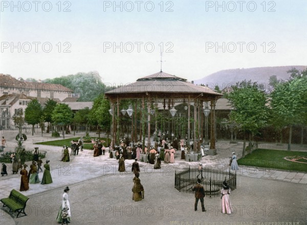 The healing spring in Bad Pyrmont in 1900. Lower Saxony. Germany. Historical. digitally restored reproduction from an original from the 19th century