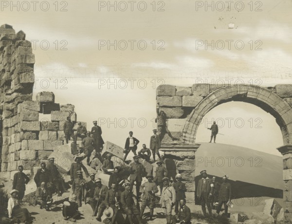 A group of Touring members among the ruins of Leptis Magna