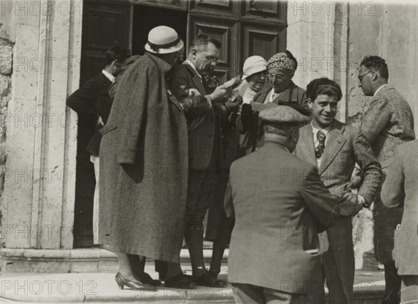 On the steps of a church.