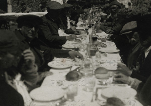 Lunch at a retreat on Etna. 
	
		1924