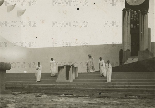 Actors on stage at the Greek Theatre of Syracuse. 
	
		1924