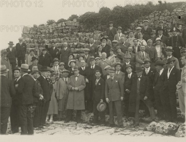 Group portrait at the archaeological site of Syracuse. 
	
		1924