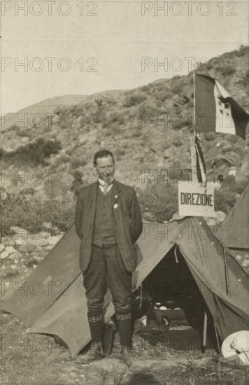 Luigi Vittorio Bertarelli in front of his tent. 1910-1920