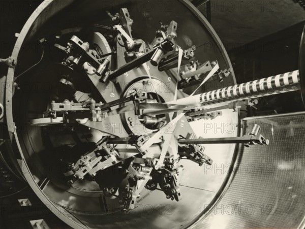 Paper cable wrapping machine at the Pirelli plant in Milan Bicocca. 1971