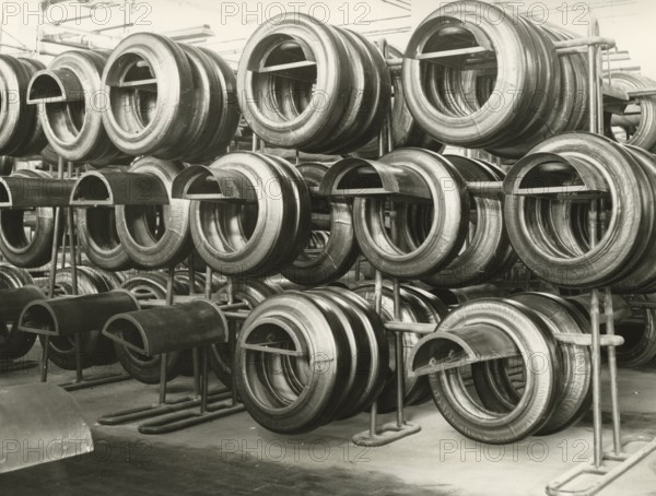 Tires awaiting vulcanization at the Pirelli plant in Milan's Bicocca district.. 1969