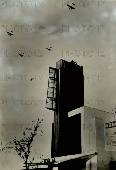 The II Atlantic Squadron flies over the Italian pavilion at the Chicago Exposition on the occasion of the Tenth Anniversary Air Cruise