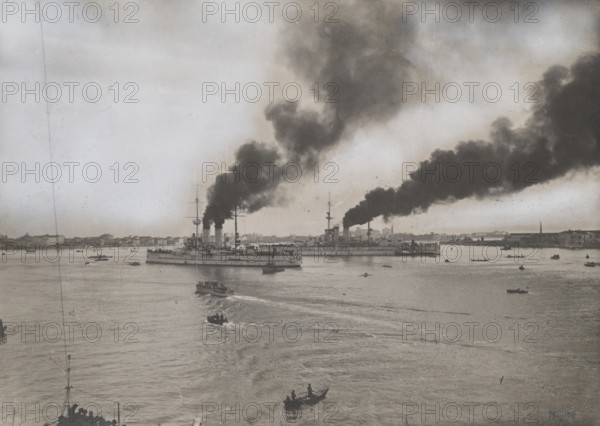 The Austrian battleships Teghetoff and Erz Franz Ferdinand enter Venice led by Italian crews.