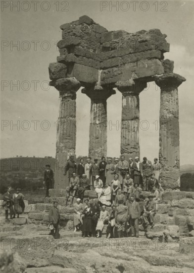 Touring Club Italiano Members in front of the Temple of the Dioscuri in Agrigento.