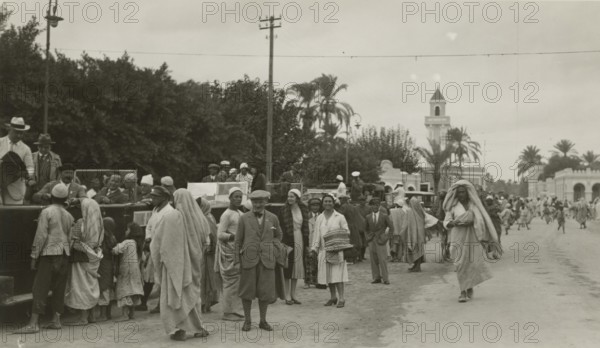 Excursionists in Suk el-Giuma. 
	
		1931