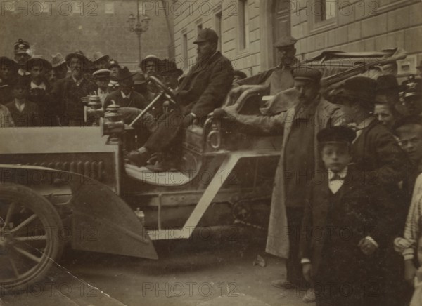 Frederick Johnson in the car. 
	
		1904